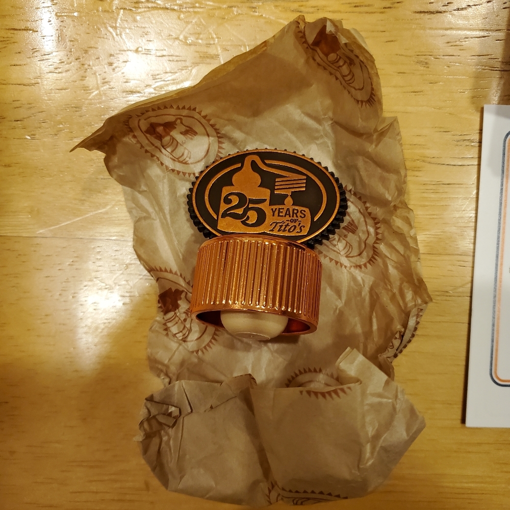 Tito’s Vodka 25th Anniversary collectible bottle topper